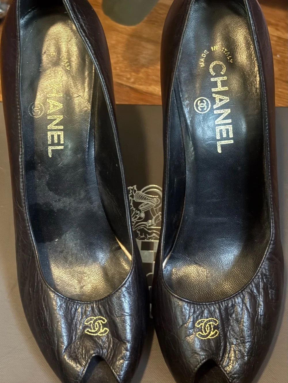 CHANEL Black Leather Peep-Toe Pumps with Gold CC Emblem